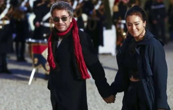 巩俐经历了8年张艺谋、富商黄和祥,是如何与大她18岁的米歇尔结婚的?